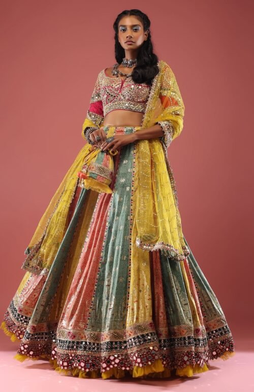 Multi Coloured Brocade Lehenga With Bandhani Print And Heavy Mirror Work On The Border